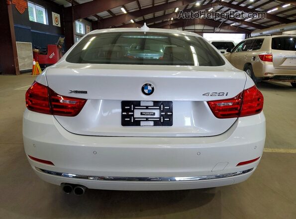 WBA4C9C51GG136141 2016 BMW 4 SERIES White Вид салону спереду