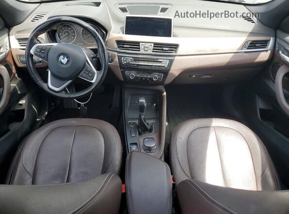 WBXHT3Z37H4A56438 2017 BMW X1 Black Vista del cuadro de instrumentos