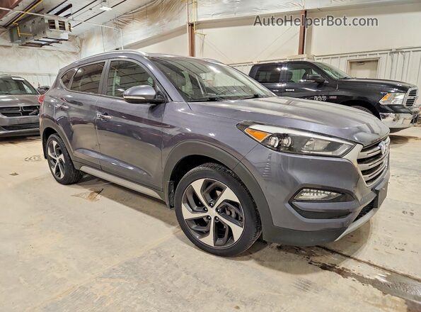 KM8J3CA24HU304820 2017 HYUNDAI TUCSON Серый 