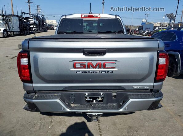 1GTP1BEK6S1173116 2025 GMC CANYON Silver Widok wnętrza z przodu
