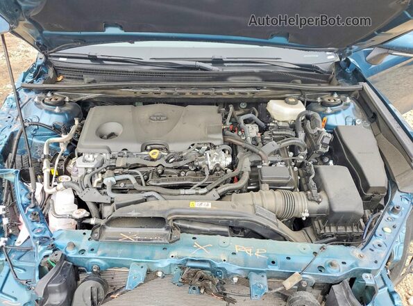 4T1DAACK2TU256988 2026 TOYOTA LE Teal Widok wnętrza z tyłu