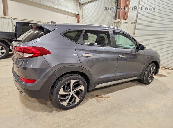 KM8J3CA24HU304820 2017 HYUNDAI TUCSON Серый 