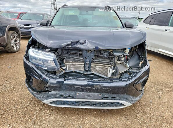 3VVCX7B28NM013021 2022 VOLKSWAGEN TAOS Black Հետևի տեսք