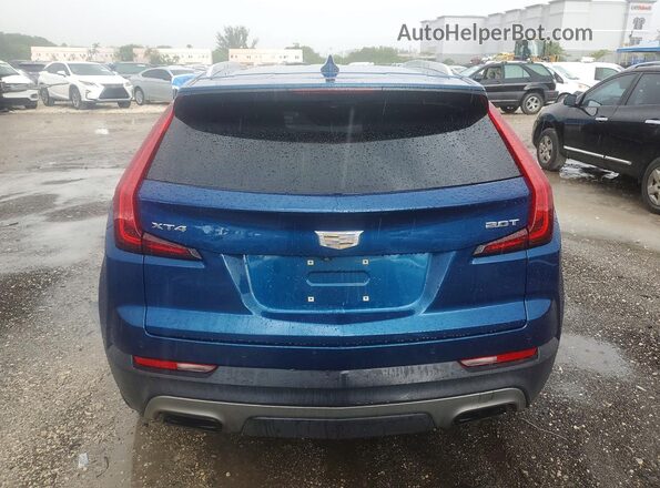 1GYFZCR42KF196539 2019 CADILLAC XT4 Blue Front interior view