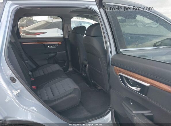 7FARW1H54ME002597 2021 HONDA CR-V Blue Вид наклейки з VIN-кодом