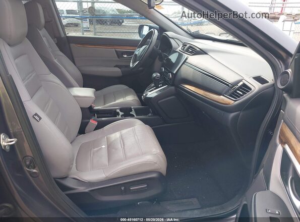 7FARW1H89KE037286 2019 HONDA CR-V Blue Front interior view