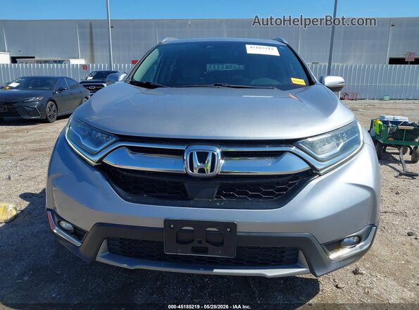 7FARW1H95KE009865 2019 HONDA CR-V Silver Սալոնի հետևի տեսք