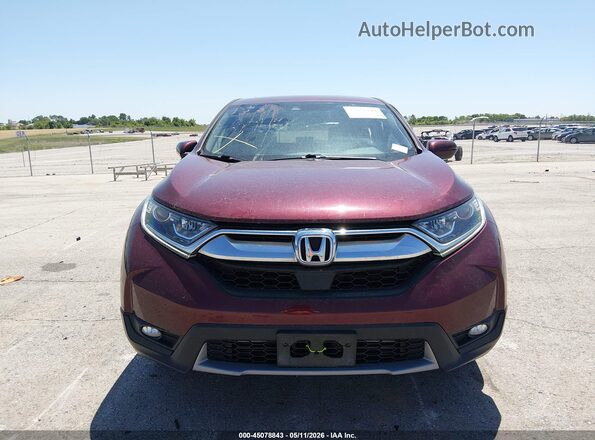 7FARW2H52JE020369 2018 HONDA CR-V Maroon Rear interior view