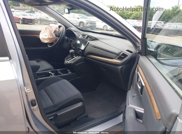 7FARW2H58KE027554 2019 HONDA CR-V Silver Front interior view