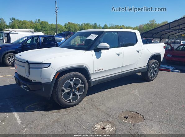 7FCTGAAA2NN011530 2022 RIVIAN R1T White Vista tres cuartos delantera izquierda