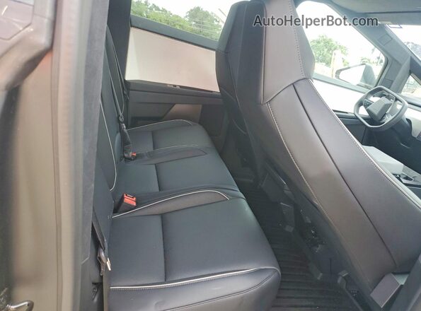 7G2CEHED0RA027880 2024 TESLA CYBERTRUCK Silver Rear interior view