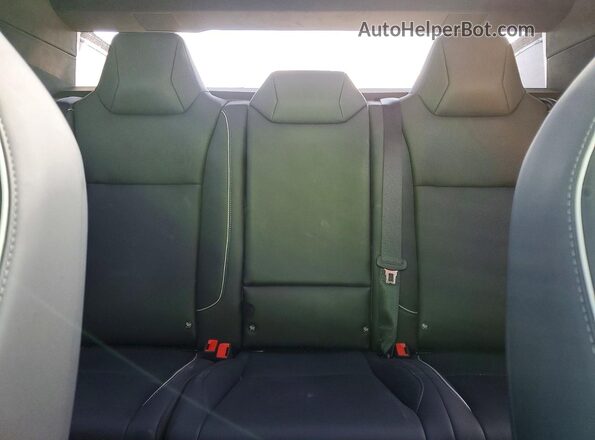 7G2CEHED1RA048818 2024 TESLA CYBERTRUCK Green Vista de los asientos traseros