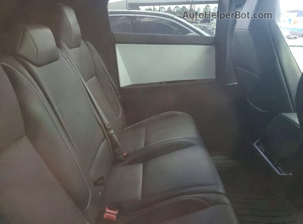 7G2CEHED3RA001645 2024 TESLA CYBERTRUCK Black Rear seats view