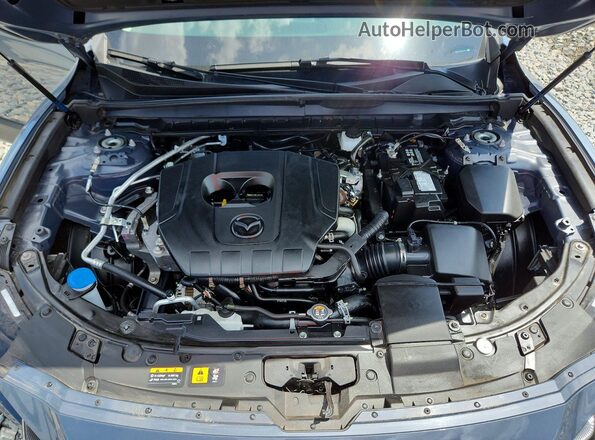 7MMVABBM4SN372610 2025 MAZDA CX-5 Gray Vista del compartimento del motor