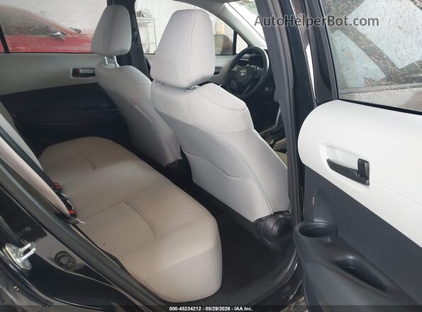 7MUAAABG5PV061472 2023 TOYOTA COROLLA CROSS Black Vista de la etiqueta del VIN