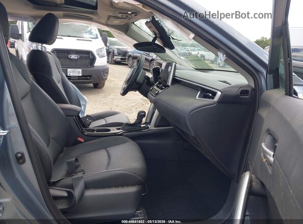 7MUDAAAG1SV146087 2025 TOYOTA COROLLA CROSS Blue Front interior view