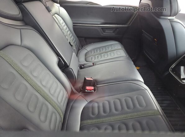 7PDSGBBA7SN048065 2025 RIVIAN R1S Зеленый Вид задней части салона