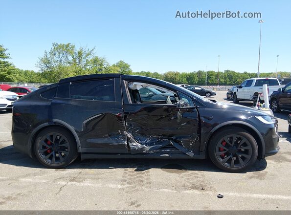 7SAXCBE60PF418653 2023 TESLA MODEL X Black Rear interior view