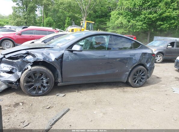 7SAYGAEE1PF835760 2023 TESLA MODEL Y Gray Vista interior trasera
