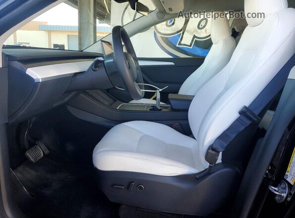7SAYGAEE1SF309721 2025 TESLA MODEL Black წინა სალონის ხედი