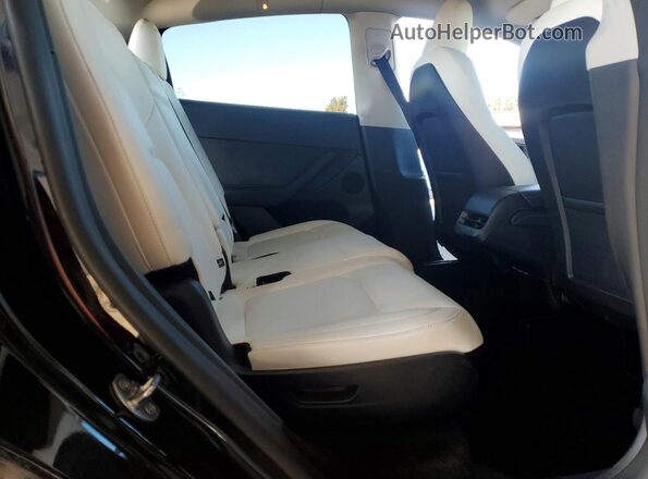 7SAYGAEE1SF309721 2025 TESLA MODEL Black უკანა სავარძლების ხედი