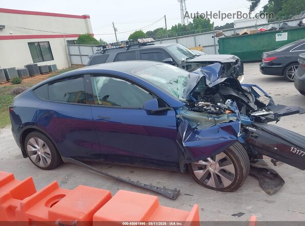 7SAYGAEE2NF426650 2022 TESLA MODEL Y Blue Սալոնի հետևի տեսք