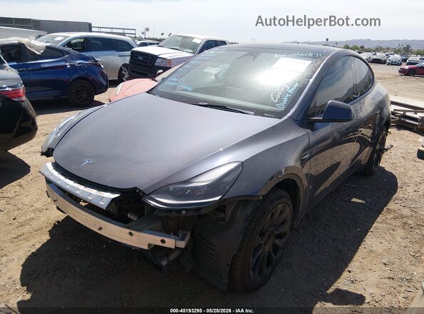 7SAYGAEE2PF668955 2023 TESLA MODEL Y Gray Առջևի ձախ երեք քառորդ տեսարան
