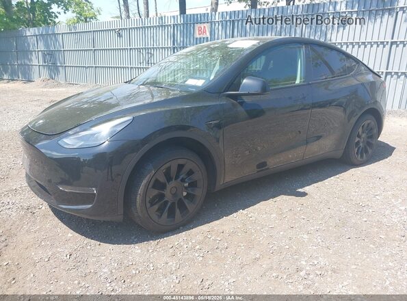 7SAYGAEE3PF770054 2023 TESLA MODEL Y Black Przód lewy