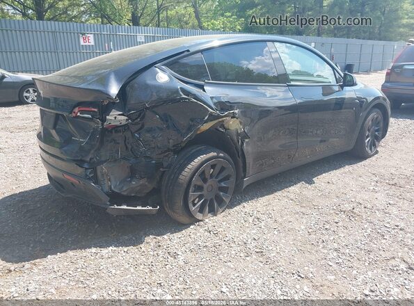 7SAYGAEE3PF770054 2023 TESLA MODEL Y Black Tył prawy