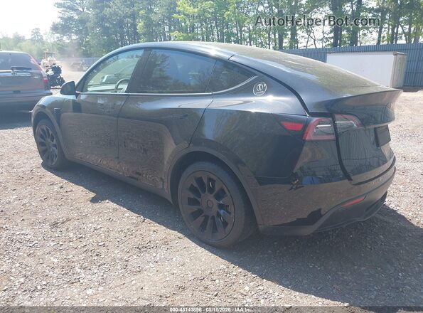7SAYGAEE3PF770054 2023 TESLA MODEL Y Black Tył lewy