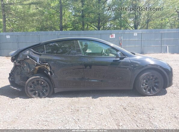 7SAYGAEE3PF770054 2023 TESLA MODEL Y Black Widok wnętrza z tyłu