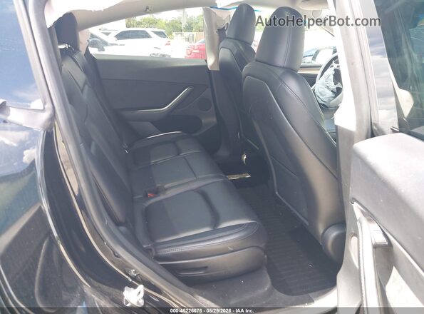7SAYGAEE3RF024271 2024 TESLA MODEL Y Black Vista de la etiqueta del VIN
