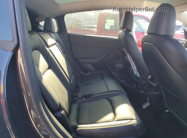 7SAYGAEE5RF064092 2024 TESLA MODEL Gray Vista de los asientos traseros