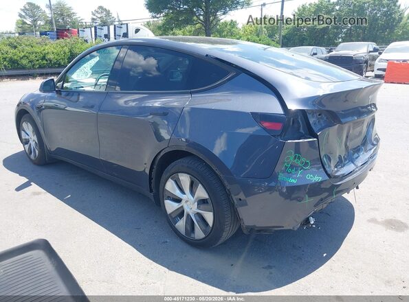 7SAYGAEE7NF433111 2022 TESLA MODEL Y Gray Trasero izquierdo