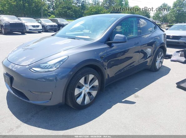 7SAYGAEE7NF433111 2022 TESLA MODEL Y Gray Vista tres cuartos delantera izquierda