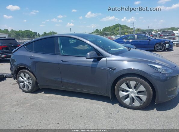 7SAYGAEE7NF433111 2022 TESLA MODEL Y Gray Vista interior trasera