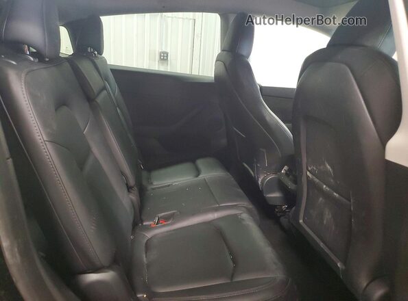 7SAYGAEE7PF770610 2023 TESLA MODEL Black Widok tylnych siedzeń