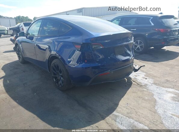 7SAYGAEE7PF946880 2023 TESLA MODEL Y Blue Tył lewy