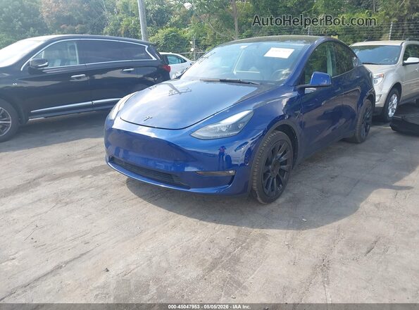 7SAYGAEE7PF946880 2023 TESLA MODEL Y Blue Przód lewy