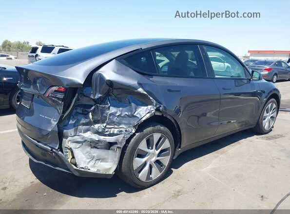 7SAYGAEEXPF907586 2023 TESLA MODEL Y Gray Widok z przodu