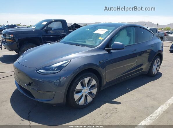 7SAYGAEEXPF907586 2023 TESLA MODEL Y Gray Przód lewy