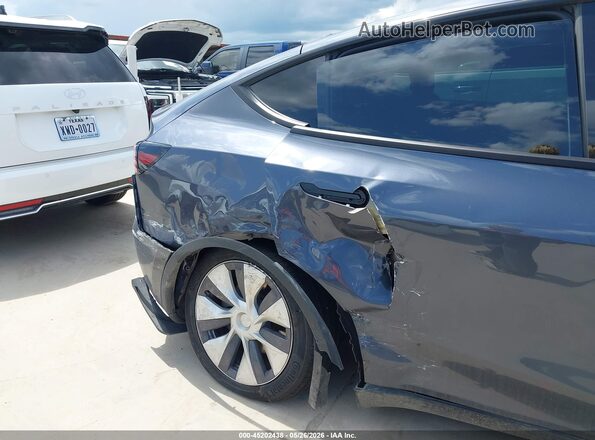 7SAYGAEEXPF941527 2023 TESLA MODEL Y Gray Դիմացի տեսք