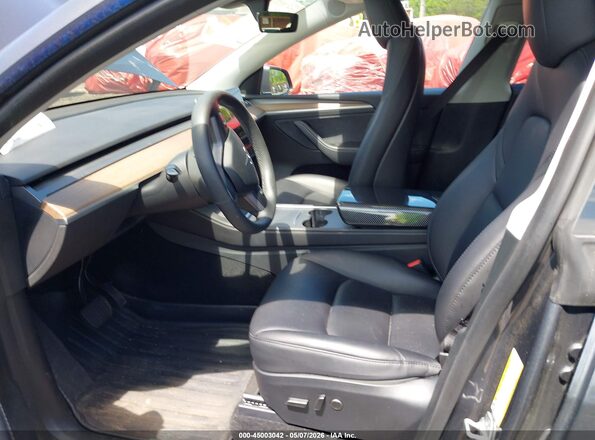 7SAYGAEEXPF967271 2023 TESLA MODEL Y Серый Вид салона спереди