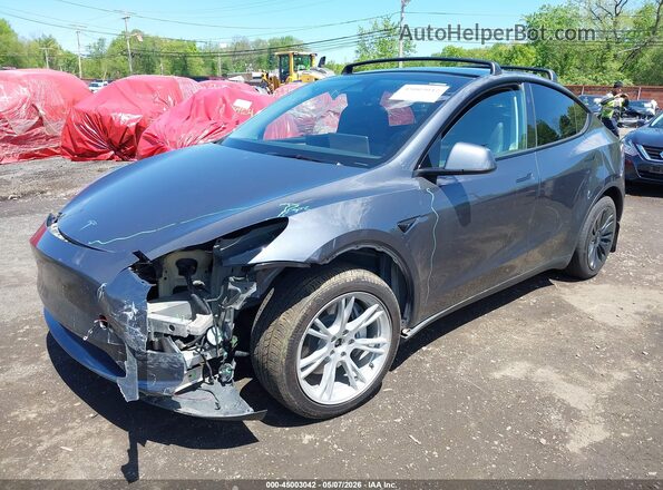 7SAYGAEEXPF967271 2023 TESLA MODEL Y Серый Вид спереди