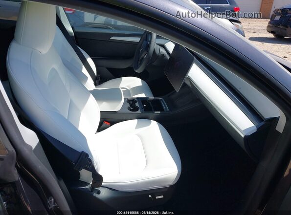 7SAYGAEEXRF106806 2024 TESLA MODEL Y Серый Вид салона спереди
