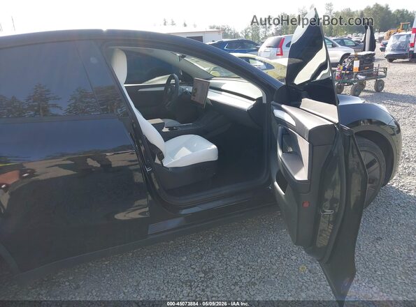 7SAYGAEEXSF278470 2025 TESLA MODEL Y Черный Вид салона спереди