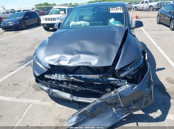 7SAYGDED0TA600380 2026 TESLA MODEL Y Gray Widok zestawu wskaźników