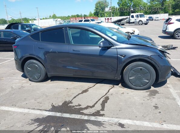 7SAYGDED0TA600380 2026 TESLA MODEL Y Gray Widok wnętrza z tyłu