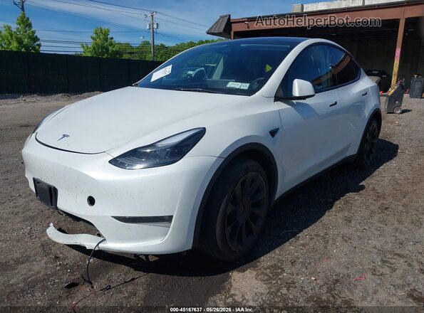 7SAYGDED1PF915696 2023 TESLA MODEL Y White წინა მარცხენა ხედი სამი მეოთხედიდან