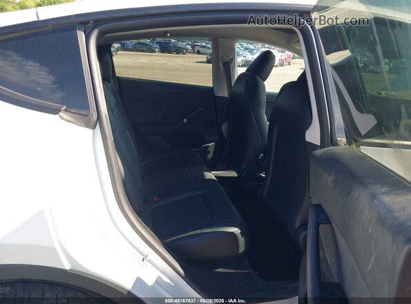7SAYGDED1PF915696 2023 TESLA MODEL Y White VIN კოდის სტიკერის ხედი